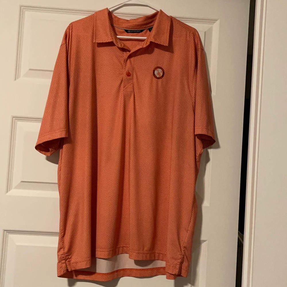 Cutter and Buck Orange patterned golf polo.